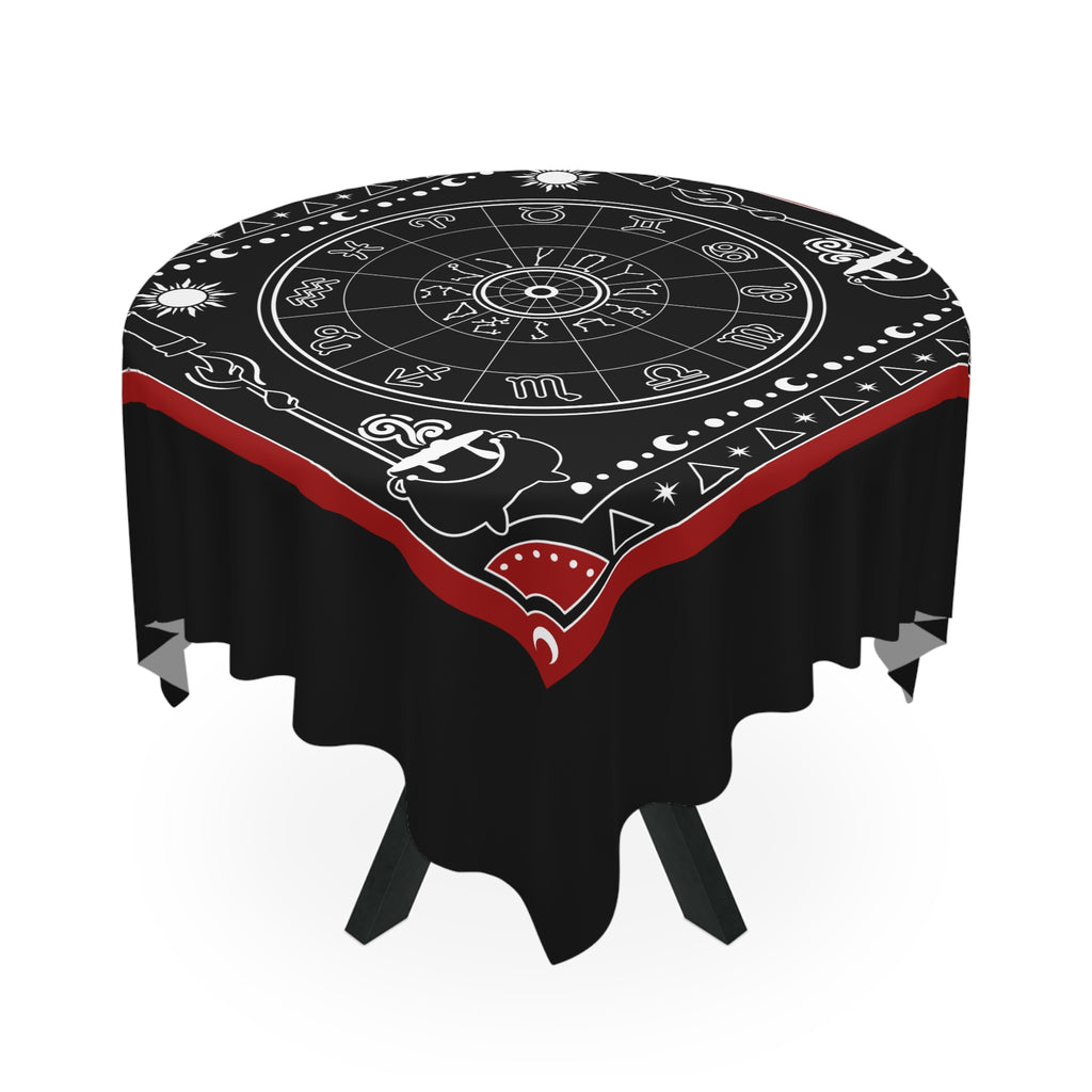 Decorative tablecloth with astrological symbols on a black background