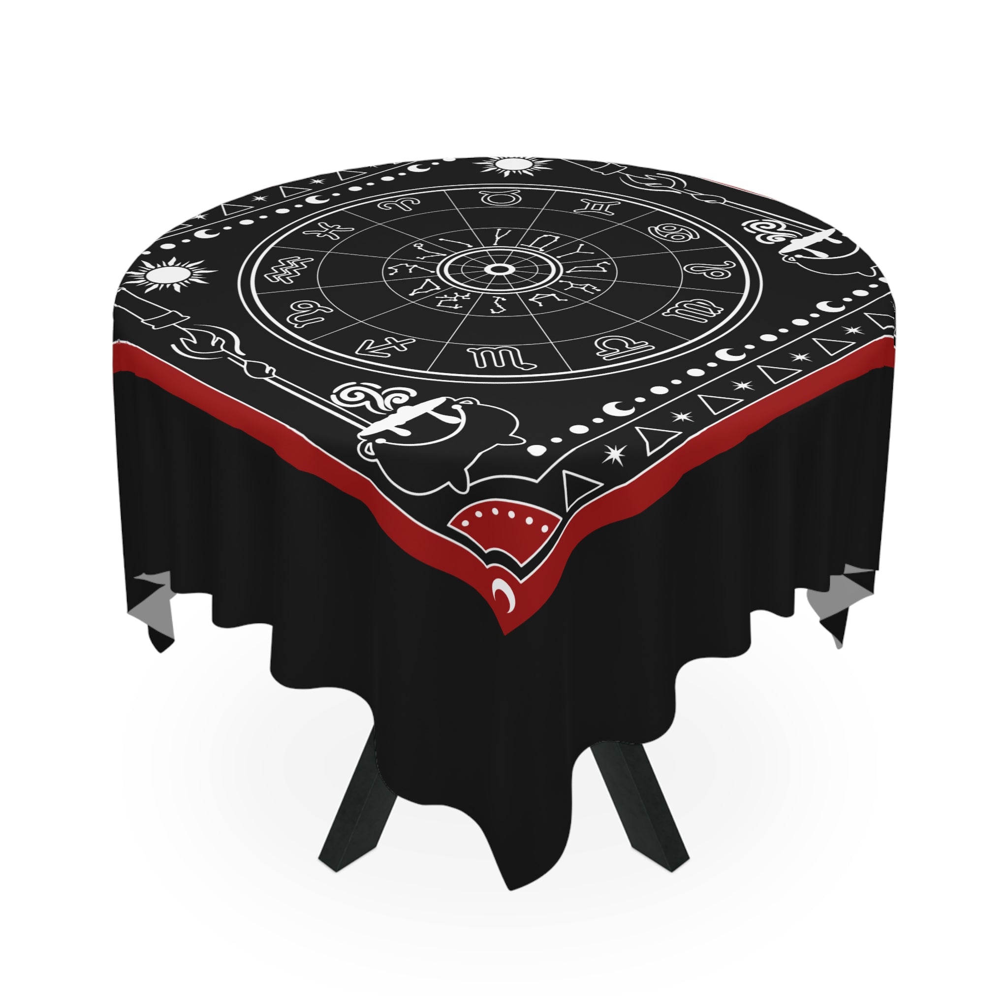Decorative tablecloth with astrological symbols on a black background