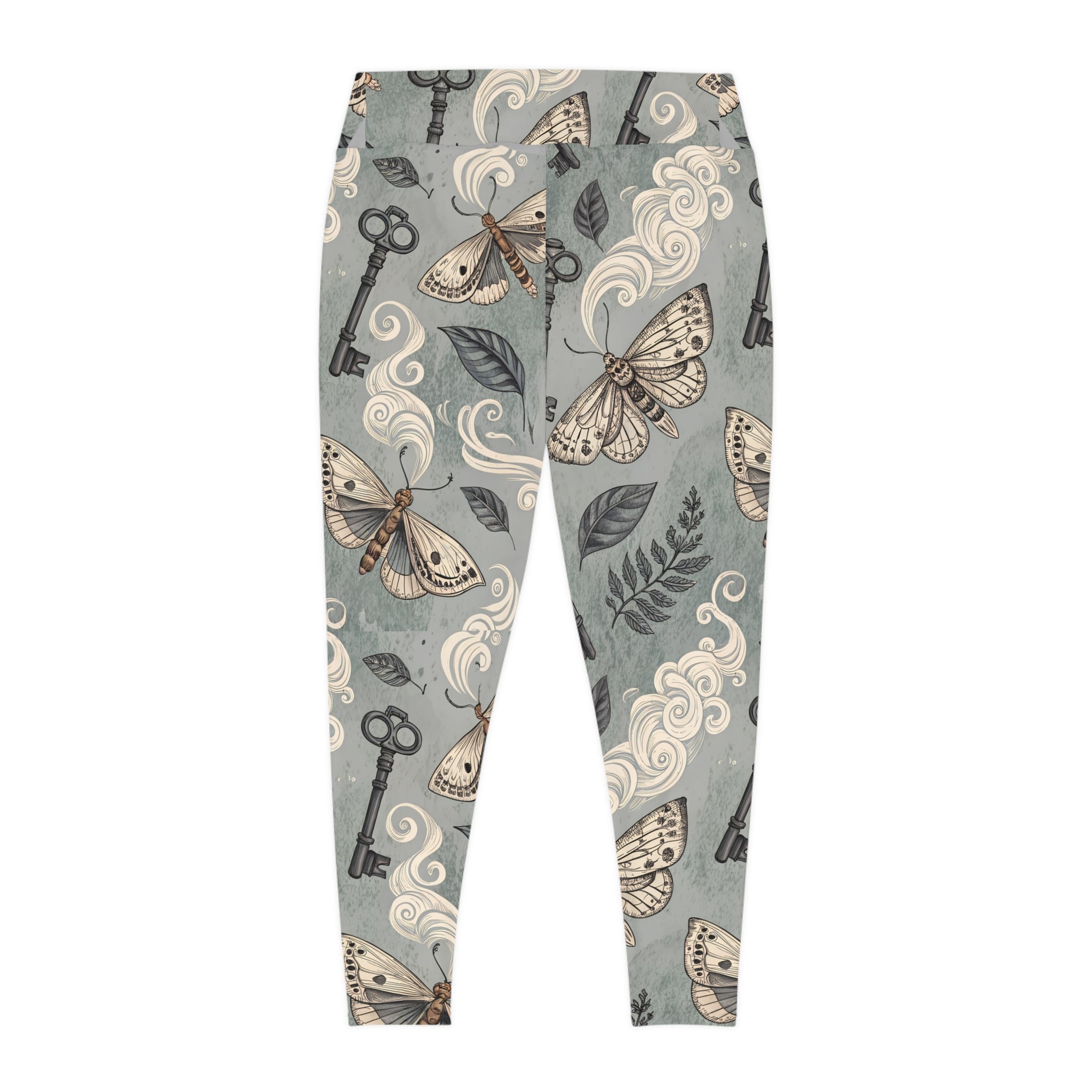 Leggings with moth and key pattern on a gray background