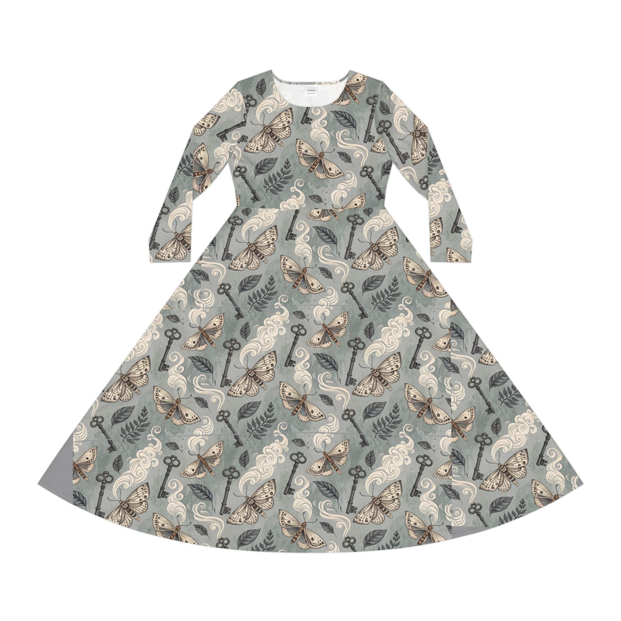 Dress with moth and key pattern on a gray background