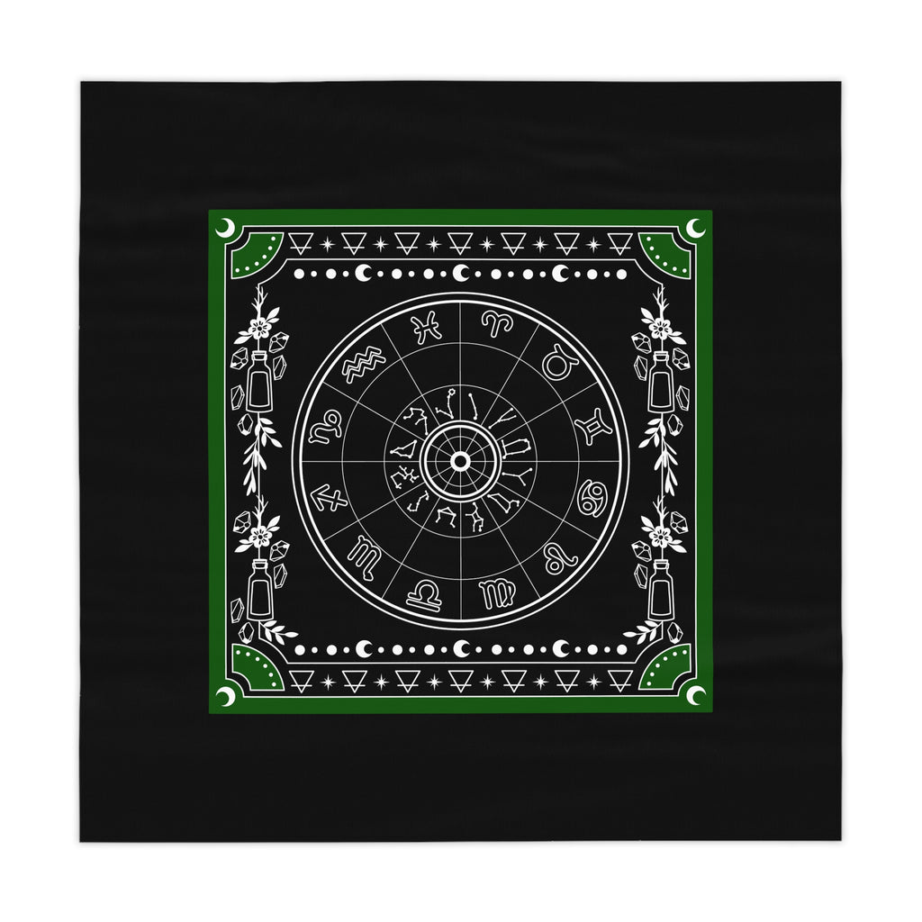 Decorative tablecloth with astrological symbols on a black background